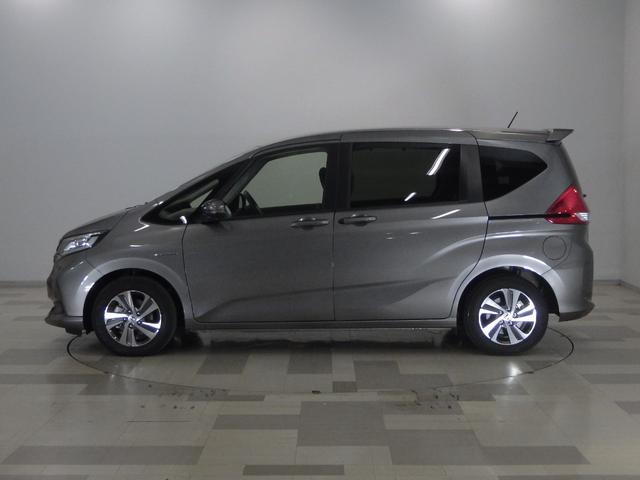 フリードハイブリッド ハイブリッド・Ｇホンダセンシング　禁煙車ホンダセンシング　Ｂｌｕｅｔｏｏｔｈ対応　メモリーナビ　フルセグ　前後ドライブレコーダー　両側Ｐスライドドア　フロントシートヒーター　ＬＥＤ　ＥＴＣ　ＶＳＡ　スマートキー　軽減ブレーキ　ＥＣＯＮ（10枚目）