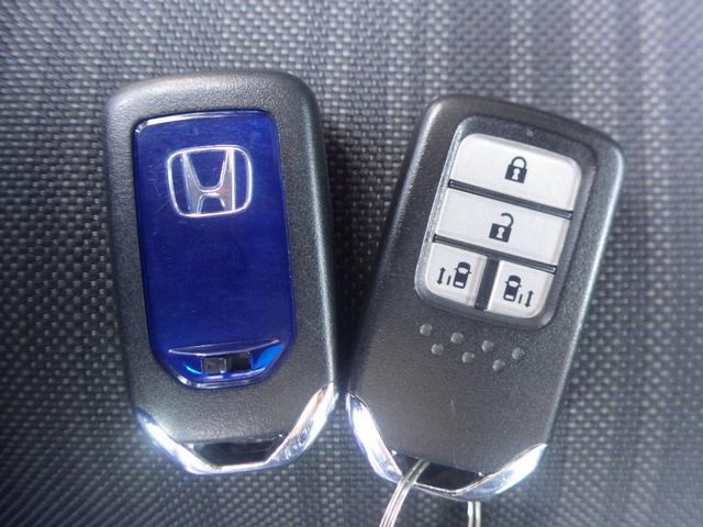 フリードハイブリッド ハイブリッド・Ｇホンダセンシング　禁煙車ホンダセンシング　Ｂｌｕｅｔｏｏｔｈ対応　メモリーナビ　フルセグ　前後ドライブレコーダー　両側Ｐスライドドア　フロントシートヒーター　ＬＥＤ　ＥＴＣ　ＶＳＡ　スマートキー　軽減ブレーキ　ＥＣＯＮ（21枚目）