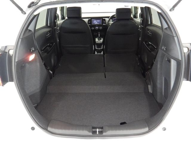 フィット ｅ：ＨＥＶホーム　禁煙車　希少ＡＷＤ　センシング６ＳＲＳ　純８インチコネクトナビ　リアカメラ　フルセグ　Ｂｌｕｅｔｏｏｔｈ　ＵＳＢ　ＳＤ　ＤＶＤ　コンフォートビュー　前後Ｐセンサー　社外ドラレコ　ＬＥＤ　ＥＴＣ　ＶＳＡ（24枚目）