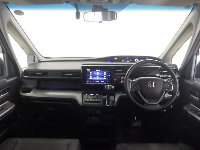 ステップワゴンスパーダ スパーダホンダセンシング　フリップダウンＭ　大型９インチナビ　前後ドラレコ　禁煙車　盗難防止　助手席エアバッグ　ワンオーナ－　Ｗパワスラ　記録簿有　地デジ　ＬＥＤライト　横滑り防止システム　オートエアコン　リアカメラ　ＵＳＢ（5枚目）