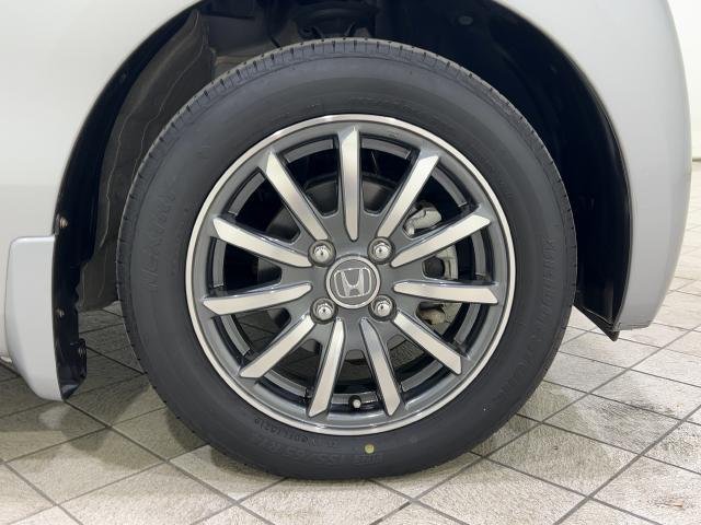 N-WGN G・ターボパッケージ 点検記録簿 地デジ サイドエアバック 盗難警報装置 ターボ車 スマートキーシステム バックモニター Iストップ 横滑り防止システム オートエアコン 禁煙車 キーレスキー DVD(13枚目)