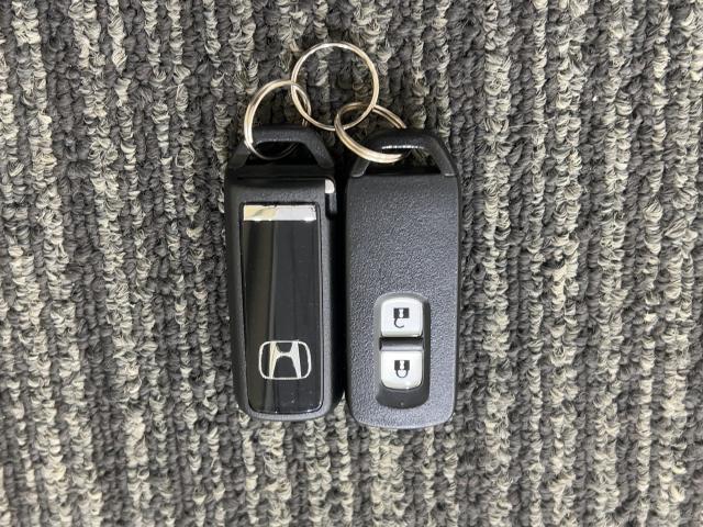 N-WGN G・ターボパッケージ 点検記録簿 地デジ サイドエアバック 盗難警報装置 ターボ車 スマートキーシステム バックモニター Iストップ 横滑り防止システム オートエアコン 禁煙車 キーレスキー DVD(23枚目)