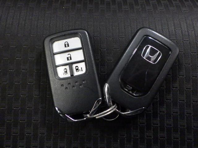 ステップワゴンスパーダ ｅ：ＨＥＶスパーダＧ・ＥＸホンダセンシング　禁煙　センシング６ＳＲＳ　９インチナビ　リアカメラ　天吊りモニター　フルセグ　Ｂｌｕｅｔｏｏｔｈ　ミュージックラック　ＵＳＢ　両パワスラ　シートヒータ　ヒーテッドミラー　革巻きハンドル　ＬＥＤ　ＥＴＣ（24枚目）