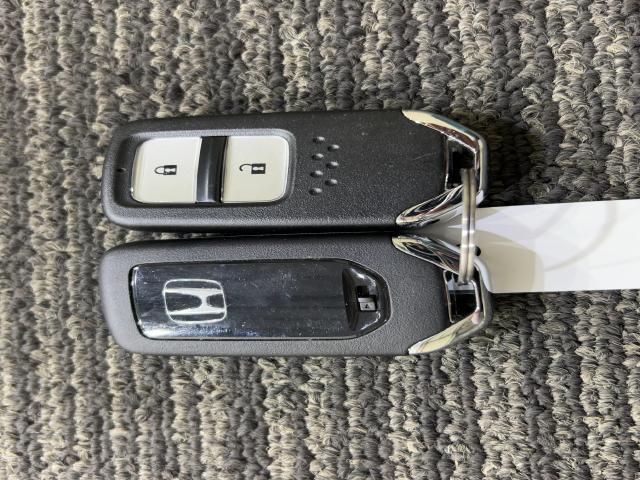 ヴェゼル Ｘ・ホンダセンシング　Ｒカメラ　Ｗエアバッグ　盗難防止　禁煙　アクティブクルーズコントロール　オートエアコン　ＬＥＤランプ　衝突軽減ブレ－キ　パワステ　整備記録簿　Ｄレコ　カーテンエアバック　ＴＶナビ（14枚目）