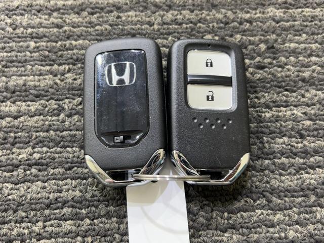 ヴェゼル Ｘ・ホンダセンシング　Ｒカメラ　Ｗエアバッグ　盗難防止　禁煙　アクティブクルーズコントロール　オートエアコン　ＬＥＤランプ　衝突軽減ブレ－キ　パワステ　整備記録簿　Ｄレコ　カーテンエアバック　ＴＶナビ（52枚目）