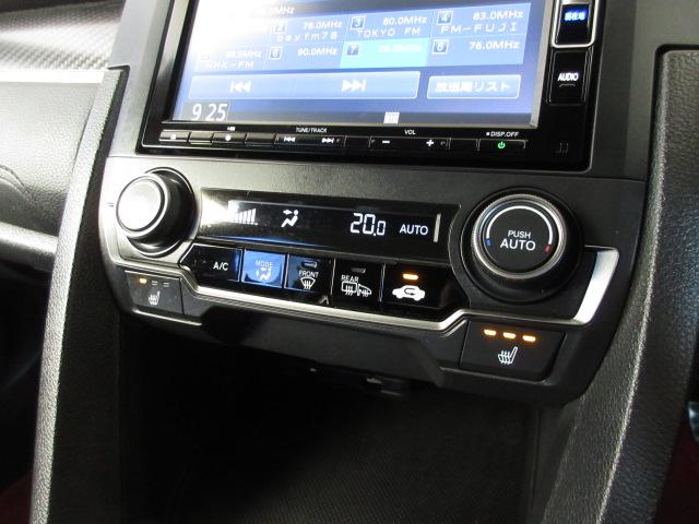 シビック ハッチバックホンダセンシング　禁煙車　６Ｍ／Ｔ　ワンオーナー　センシング　ＬＥＤヘッドライト　シートヒーター　無限フロアマット　無限バイザー　タイプＲリアスポイラー　ナビ　リアカメラ　社外マフラー　ＬＥＤルームライト　ＥＴＣ車載器（10枚目）