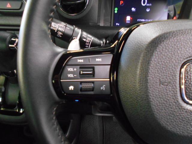 N-BOXカスタム ターボ 禁煙車 元試乗車 1オーナー 8インチコネクトナビ リアカメラ LEDヘッドライト パドルシフト シートヒーター ドアバイザー 革巻きステアリング 左右パワースライドドア シートバックテーブル(11枚目)