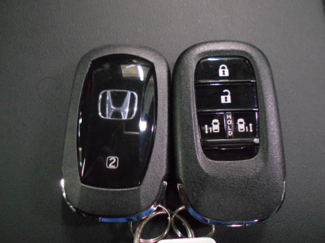 N-BOXカスタム ターボ 禁煙車 元試乗車 1オーナー 8インチコネクトナビ リアカメラ LEDヘッドライト パドルシフト シートヒーター ドアバイザー 革巻きステアリング 左右パワースライドドア シートバックテーブル(22枚目)