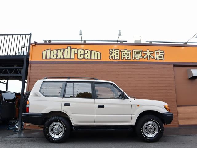ランドクルーザープラド ＴＸリミテッド　Ｃｌａｓｓｉｃカスタムコンプリート　丸目フェイス　ボディカラーアイボリー　クリムソン　カルフォルニア　ＢＦグッドリッチＡＴタイヤ　各所マッドブラック塗装　オレンジコーナーレンズ　フルセグ地デジナビ（12枚目）