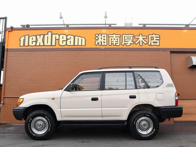ランドクルーザープラド ＴＸリミテッド　Ｃｌａｓｓｉｃカスタムコンプリート　丸目フェイス　ボディカラーアイボリー　クリムソン　カルフォルニア　ＢＦグッドリッチＡＴタイヤ　各所マッドブラック塗装　オレンジコーナーレンズ　フルセグ地デジナビ（13枚目）