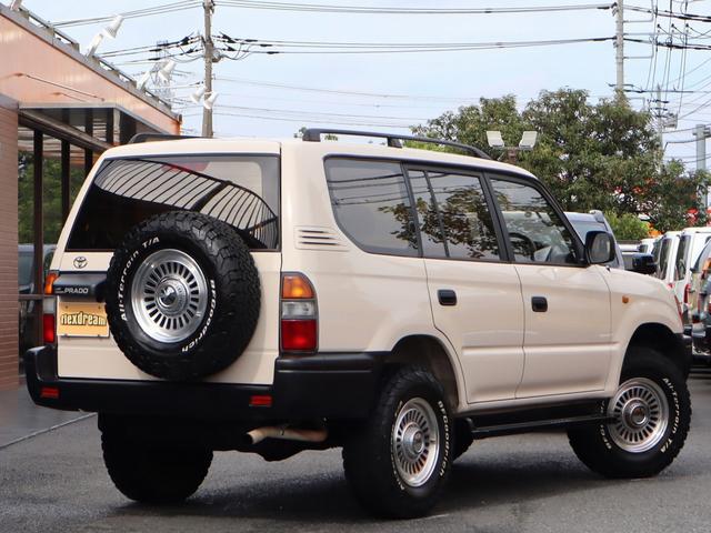 ランドクルーザープラド ＴＸリミテッド　Ｃｌａｓｓｉｃカスタムコンプリート　丸目フェイス　ボディカラーアイボリー　クリムソン　カルフォルニア　ＢＦグッドリッチＡＴタイヤ　各所マッドブラック塗装　オレンジコーナーレンズ　フルセグ地デジナビ（46枚目）