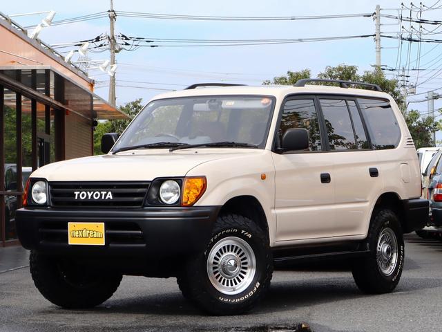 ランドクルーザープラド ＴＸリミテッド　Ｃｌａｓｓｉｃカスタムコンプリート　丸目フェイス　ボディカラーアイボリー　クリムソン　カルフォルニア　ＢＦグッドリッチＡＴタイヤ　各所マッドブラック塗装　オレンジコーナーレンズ　フルセグ地デジナビ（47枚目）
