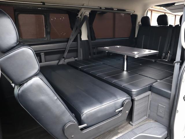 ハイエースワゴン ＧＬ　パールホワイト　ＬＥＤヘッドライト　ヴァレンティ：テールランプ　フロントリップスポイラー　１７インチアルミホイール＆ＴＯＹＯ　Ｈ２０タイヤ　ローダウン　フルセグ地デジナビ　フリップダウンモニター（12枚目）