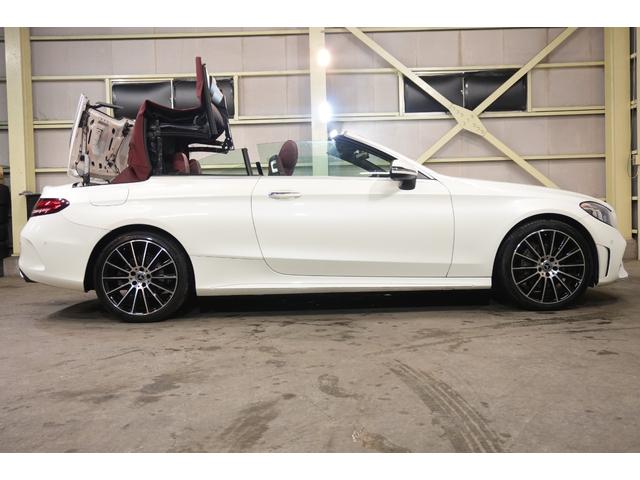 Ｃクラス Ｃ１８０カブリオレスポーツ　レザーエクスクルーシブＰＫＧ　後期　赤幌　赤革　シートヒーター　エアスカーフ　フルセグＴＶ　ＨＵＤ　バックカメラ　ＣａｒＰｌａｙ　Ｍｅコネクト　ＬＥＤライト　ＡＭＧエアロ＆１９インチＡＷ　２年保証（7枚目）