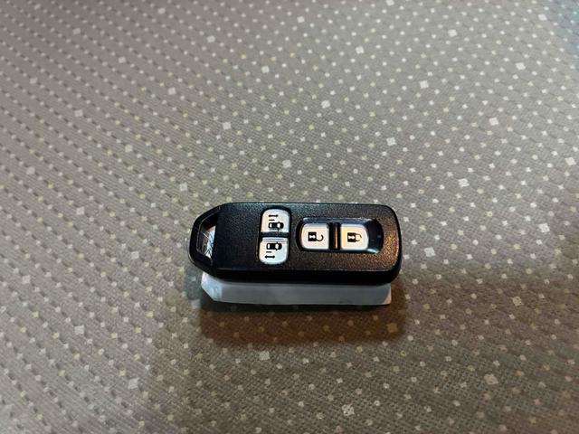 Ｎ－ＢＯＸ Ｇ・Ｌパッケージ　両側電動スライドドア　スマートキー　アイドリングストップ　電動格納ミラー　ベンチシート　ＣＶＴ　盗難防止システム　ＡＢＳ　ＥＳＣ　ＣＤ　ミュージックプレイヤー接続可　アルミホイール　衝突安全ボディ（21枚目）