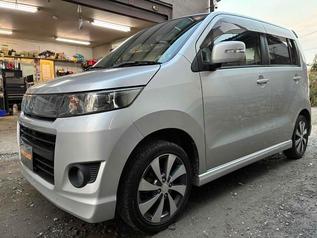 ワゴンＲスティングレー リミテッドＩＩ　オートライト　ＨＩＤ　スマートキー　電動格納ミラー　シートヒーター　ベンチシート　ＣＶＴ　盗難防止システム　ＡＢＳ　ＣＤ　ミュージックプレイヤー接続可　アルミホイール　衝突安全ボディ　エアコン（12枚目）