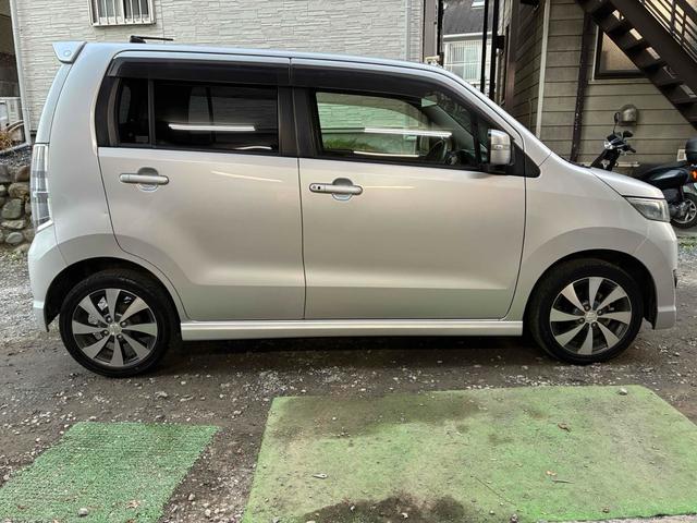 ワゴンＲスティングレー リミテッドＩＩ　オートライト　ＨＩＤ　スマートキー　電動格納ミラー　シートヒーター　ベンチシート　ＣＶＴ　盗難防止システム　ＡＢＳ　ＣＤ　ミュージックプレイヤー接続可　アルミホイール　衝突安全ボディ　エアコン（14枚目）