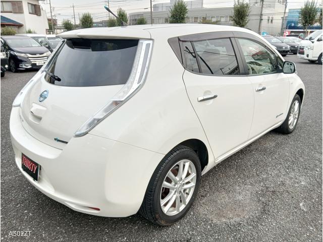リーフ Ｘ　１０セグ　禁煙車　クルコン　ＥＴＣ　純正ナビ　フルセグ　バックカメラ　Ｂｌｕｅｔｏｏｔｈ　シートヒーター　ＬＥＤヘッド　前フォグ　オートライト　ドアバイザー　スマートキー　ＰＵＳＨスタート　純正アルミ（10枚目）