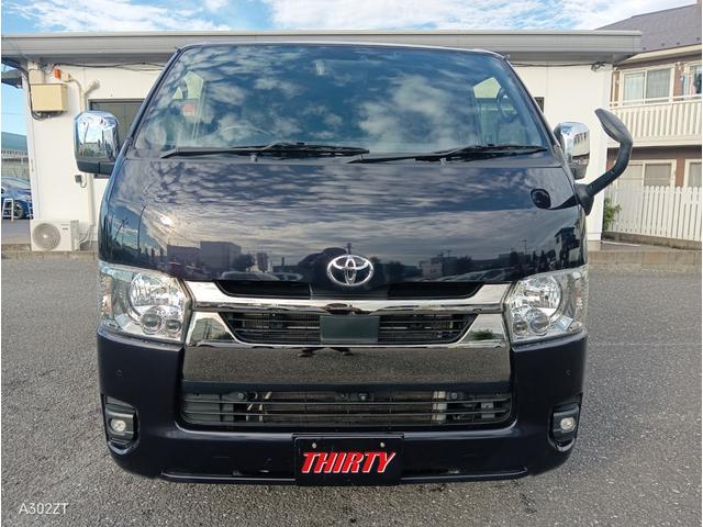 ハイエースバン スーパーＧＬ　ダークプライムＩＩ　１オーナー　ＴＴＳ　両側パワスラ障害物センサー　全周囲カメラ　デジタルインナーミラー　純正ナビ　Ｂカメラ　ＨＤＭＩ　ＵＳＢ　ＡＣ１００Ｖ　ＬＥＤヘッド　フォグ　ＥＴＣ　車線逸脱警告　２２０ブラック（2枚目）