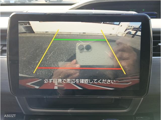 フリードハイブリッド ハイブリッド・ＥＸ　ホンダセンシング　９インチフローティングナビ　ＡＣＣ　後席モニター２個　両側パワースライド　ＬＥＤライト　シートヒーター　バックカメラ　フルセグＴＶ　プリクラッシュセーフティー　車線逸脱警告　６人乗（3枚目）