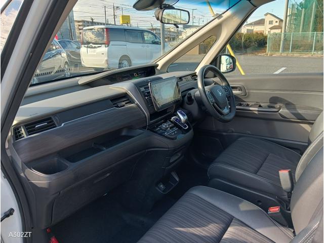 フリードハイブリッド ハイブリッド・ＥＸ　ホンダセンシング　９インチフローティングナビ　ＡＣＣ　後席モニター２個　両側パワースライド　ＬＥＤライト　シートヒーター　バックカメラ　フルセグＴＶ　プリクラッシュセーフティー　車線逸脱警告　６人乗（17枚目）