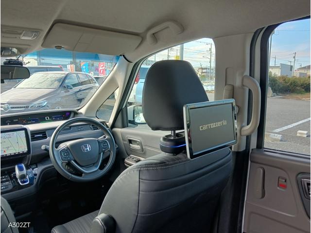 フリードハイブリッド ハイブリッド・ＥＸ　ホンダセンシング　９インチフローティングナビ　ＡＣＣ　後席モニター２個　両側パワースライド　ＬＥＤライト　シートヒーター　バックカメラ　フルセグＴＶ　プリクラッシュセーフティー　車線逸脱警告　６人乗（39枚目）