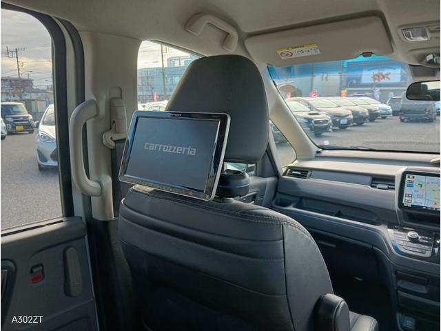 フリードハイブリッド ハイブリッド・ＥＸ　ホンダセンシング　９インチフローティングナビ　ＡＣＣ　後席モニター２個　両側パワースライド　ＬＥＤライト　シートヒーター　バックカメラ　フルセグＴＶ　プリクラッシュセーフティー　車線逸脱警告　６人乗（40枚目）