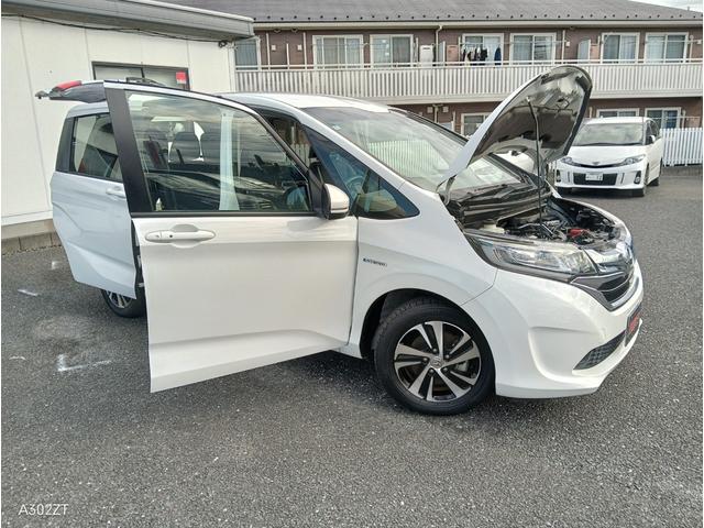 フリードハイブリッド ハイブリッド・ＥＸ　ホンダセンシング　９インチフローティングナビ　ＡＣＣ　後席モニター２個　両側パワースライド　ＬＥＤライト　シートヒーター　バックカメラ　フルセグＴＶ　プリクラッシュセーフティー　車線逸脱警告　６人乗（58枚目）