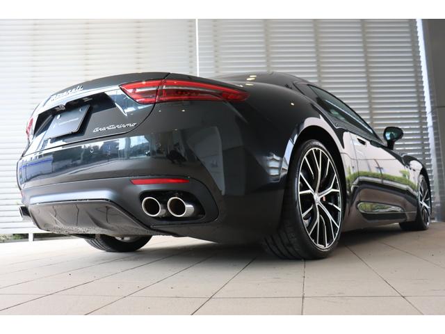 グラントゥーリズモ モデナ ワンオーナー クライメート コンフォート ADASベース スポーツデザインPKG グレージュレザー ラディカウッドトリム レッド・キャリパー 20/21ペガソ鍛造ホイール(グロッシーブラック)(8枚目)