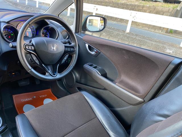 フィットシャトルハイブリッド ハイブリッド ワンオーナー スマートキー ナビ バックカメラ 地デジTV クルコン ステアリングスイッチ オートライト ETC 記録簿(27枚目)