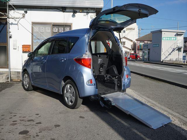 ラクティス 　福祉車両　Ｇ車いす仕様車タイプ１助手席側リヤシート付　禁煙車　電動固定装置　後退防止ベルト　車高調整　純正ＳＤナビ　ワンセグテレビ　バックカメラ　ＥＴＣ　キーレス（9枚目）