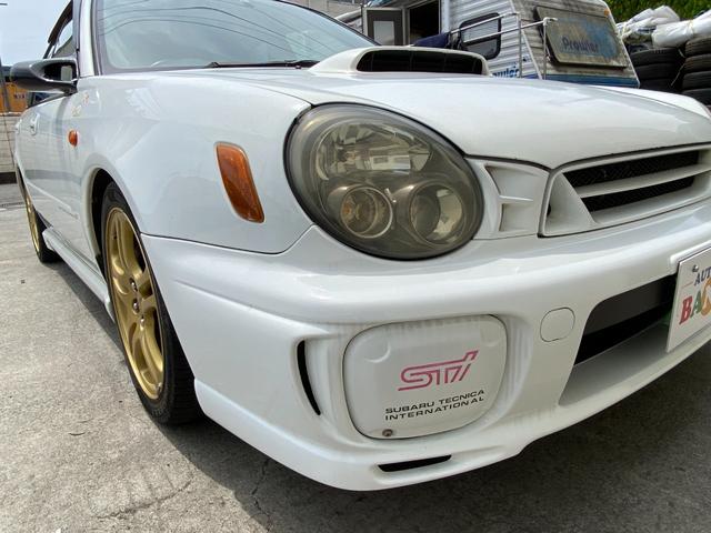 インプレッサスポーツワゴン ＳＴｉ　ＡＢＳ　アルミホイール１７インチ　衝突安全ボディ　キーレスエントリー　４ＷＤ　ＨＩＤ　ＣＤ　ＭＤ　６ＭＴ　マニュアル車　修復歴無し（41枚目）