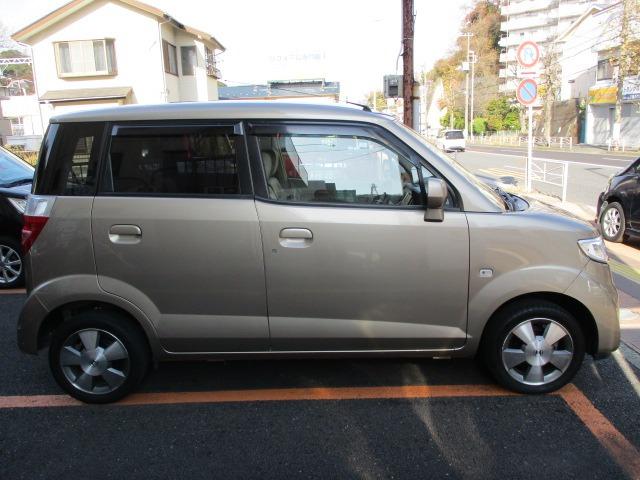 ゼスト Ｗ　４ＷＤ　社外ナビ　ワンセグＴＶ　禁煙車　キーレス　純正アルミホイール（5枚目）