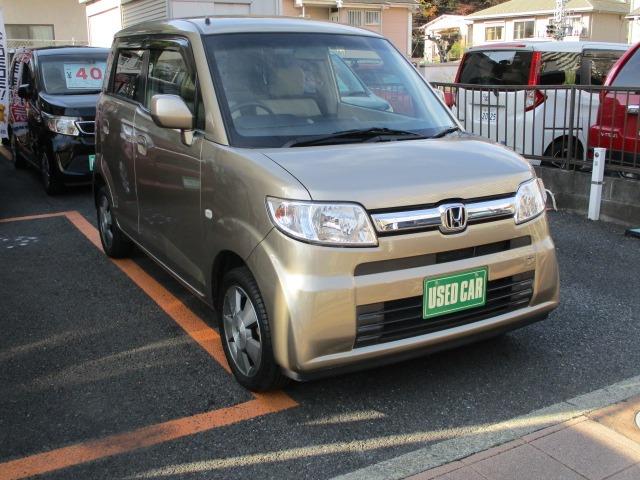 ゼスト Ｗ　４ＷＤ　社外ナビ　ワンセグＴＶ　禁煙車　キーレス　純正アルミホイール（7枚目）