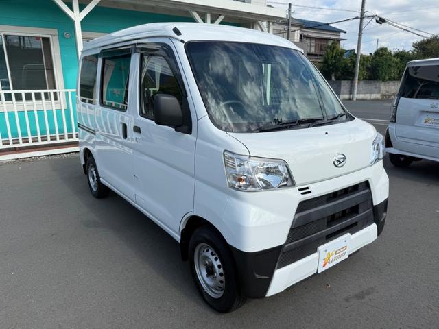 ハイゼットカーゴ  ハイルーフ キーレス 前パワーウィンドウ 衝突被害軽減ブレーキ スマートアシスト ハロゲンライト 社外ナビ ETC ドライブレコーダー クリアランスソナー 両側スライドドア プライバシーガラス 記録簿(12枚目)