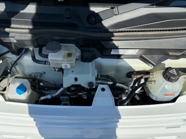 NV100クリッパーバン DX GLセーフティパッケージ ハイルーフ キーレス 前パワーウィンドウ 電格ミラー 社外ナビ ハロゲンライト 両側スライドドア 衝突被害軽減ブレーキ プライバシーガラス 軽貨物 軽バン(21枚目)