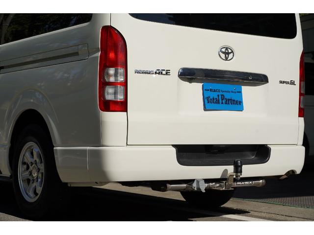 ハイエースバン ロングスーパーＧＬ　４ＷＤ／ワンオーナー／寒冷地仕様／３．０００ｃｃ／ディーゼルターボ／後席シートベルト／Ｗエアーバック／スライドガラス／１００Ｖ電源／純正キーレス／イモビライザー付／ナビ／ＴＶ／バックカメラ／ＥＴＣ／（9枚目）