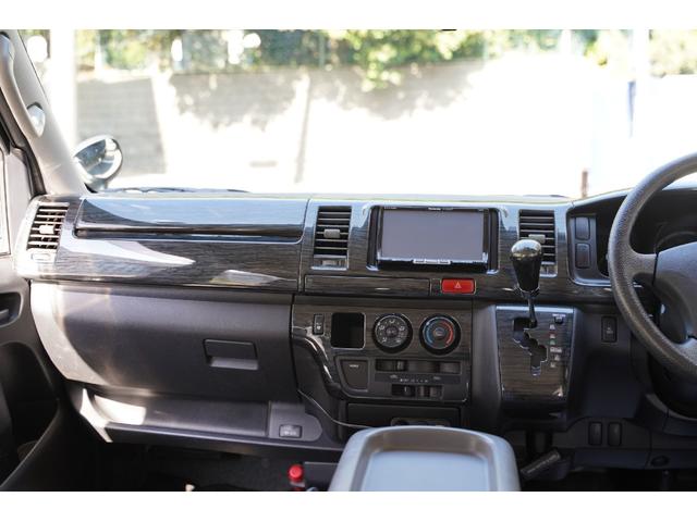 ハイエースバン スーパーGL 2.000cc/ガソリン/サイドスライドガラス/GOODYEAR製バンタイヤ/Wエアーバック/後席シートベルト/純正キーレス/純正盗難防止装置付/ナビ/バックカメラ/ETC/TV/インテリアパネル/(63枚目)