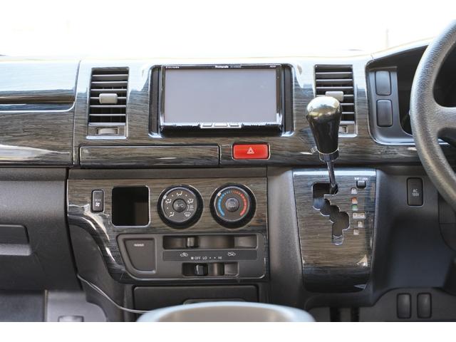 ハイエースバン スーパーGL 2.000cc/ガソリン/サイドスライドガラス/GOODYEAR製バンタイヤ/Wエアーバック/後席シートベルト/純正キーレス/純正盗難防止装置付/ナビ/バックカメラ/ETC/TV/インテリアパネル/(65枚目)