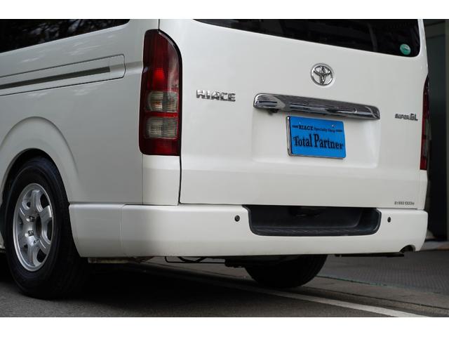 ハイエースバン ロングスーパーGL 3.000cc/ディーゼルターボ/3型/純正HIDヘッドライトユニット/純正クリアランスソナー/Wエアーバック/玄武ローダウンキット/サイドスライドガラス/キーレス/ナビ/バックカメラ/TV/ETC(9枚目)