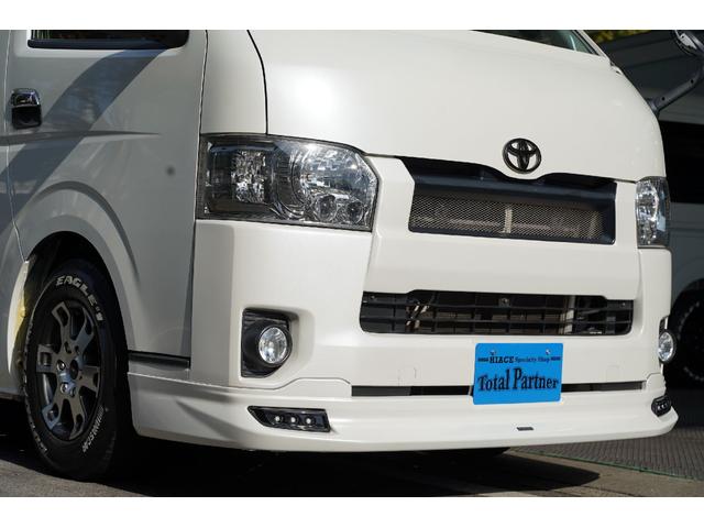 ハイエースバン スーパーＧＬ　ダークプライム　２．０００ｃｃ／ガソリン／６速ＡＴ／両側電動スライドドア／スマートキー／Ｗエアーバック／ＴＲＤホイール／モデリスタＬＥＤリップ／デジタルインナーミラー／ＥＴＣ２．０／ナビ／Ｂカメラ／ブルートゥース／（6枚目）