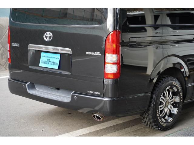ハイエースバン ロングスーパーＧＬ　４ＷＤ／ガソリン／２．７００ｃｃ／ワイドミドル／ＬＥＤヘッドライト／純正クリアランスソナー／１６インチＡＷ／マッドタイヤ／キーレス／イモビ付／ナビ／Ｂカメラ／ＥＴＣ／シートカバー／ブルートゥース／（56枚目）