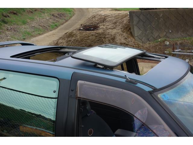 セレナ キタキツネ　４ＷＤ　８人乗り　３列シート　回転シート　フルフラット　Ｗサンルーフ　イージークロージャー　ＭＯＯＮＥＹＥＳ製スピードマスター　Ｗエアコン　キーレス　ＥＴＣ　キタキツネ専用グリルガード　ＳＲ２０ＤＥ（4枚目）