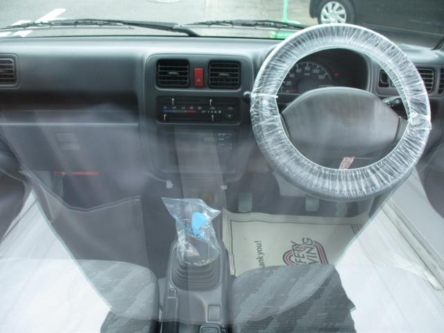 キャリイトラック ＦＣエアコン・パワステ　ショートホイールベース　パートタイム４ＷＤ　５速マニュアル　エアコン　パワステ　ＡＭ／ＦＭラジオ　サイドバイザー　ゲートプロテクタ　ヘッドライトレベライザー（10枚目）