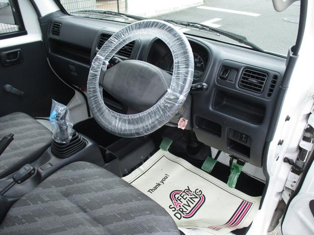 キャリイトラック ＦＣエアコン・パワステ　ショートホイールベース　パートタイム４ＷＤ　５速マニュアル　エアコン　パワステ　ＡＭ／ＦＭラジオ　サイドバイザー　ゲートプロテクタ　ヘッドライトレベライザー（11枚目）