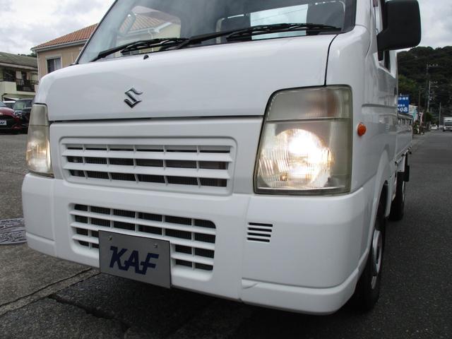 キャリイトラック ＦＣエアコン・パワステ　ショートホイールベース　パートタイム４ＷＤ　５速マニュアル　エアコン　パワステ　ＡＭ／ＦＭラジオ　サイドバイザー　ゲートプロテクタ　ヘッドライトレベライザー（34枚目）