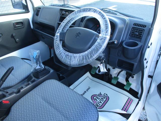 キャリイトラック ＫＣエアコン・パワステ　４ＷＤ　５速マニュアル　エアコン　パワステ　三方開　ＡＭ／ＦＭラジオ　ゲートプロテクタ　サイドバイザー　フロアマット　ＥＴＣ　禁煙車（11枚目）