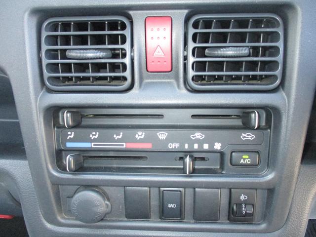 キャリイトラック ＫＣエアコン・パワステ　４ＷＤ　５速マニュアル　エアコン　パワステ　三方開　ＡＭ／ＦＭラジオ　ゲートプロテクタ　サイドバイザー　フロアマット　ＥＴＣ　禁煙車（24枚目）