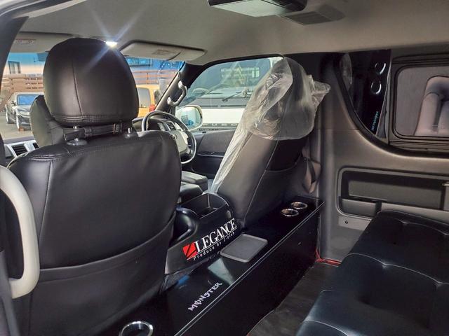 ハイエースワゴン GL 車検整備付 キーレス プッシュスタート 電格ミラー CD DVD再生 TV ナビ ETC バックカメラ リアモニター アルミ ローダウン 車高調 クルコン エアロ フルフラット ACコンセント(25枚目)