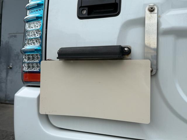 ジムニー ＸＧ　６型　５ＭＴ　車検２年付　猪狩バンパー　リフトアップ　ブリスターフェンダー　ナンバー移設キット　社外マフラー　社外１６インチＡＷ　社外エアクリ　社外ステアリング　社外テール　社外ラテラル　防錆塗装済（20枚目）